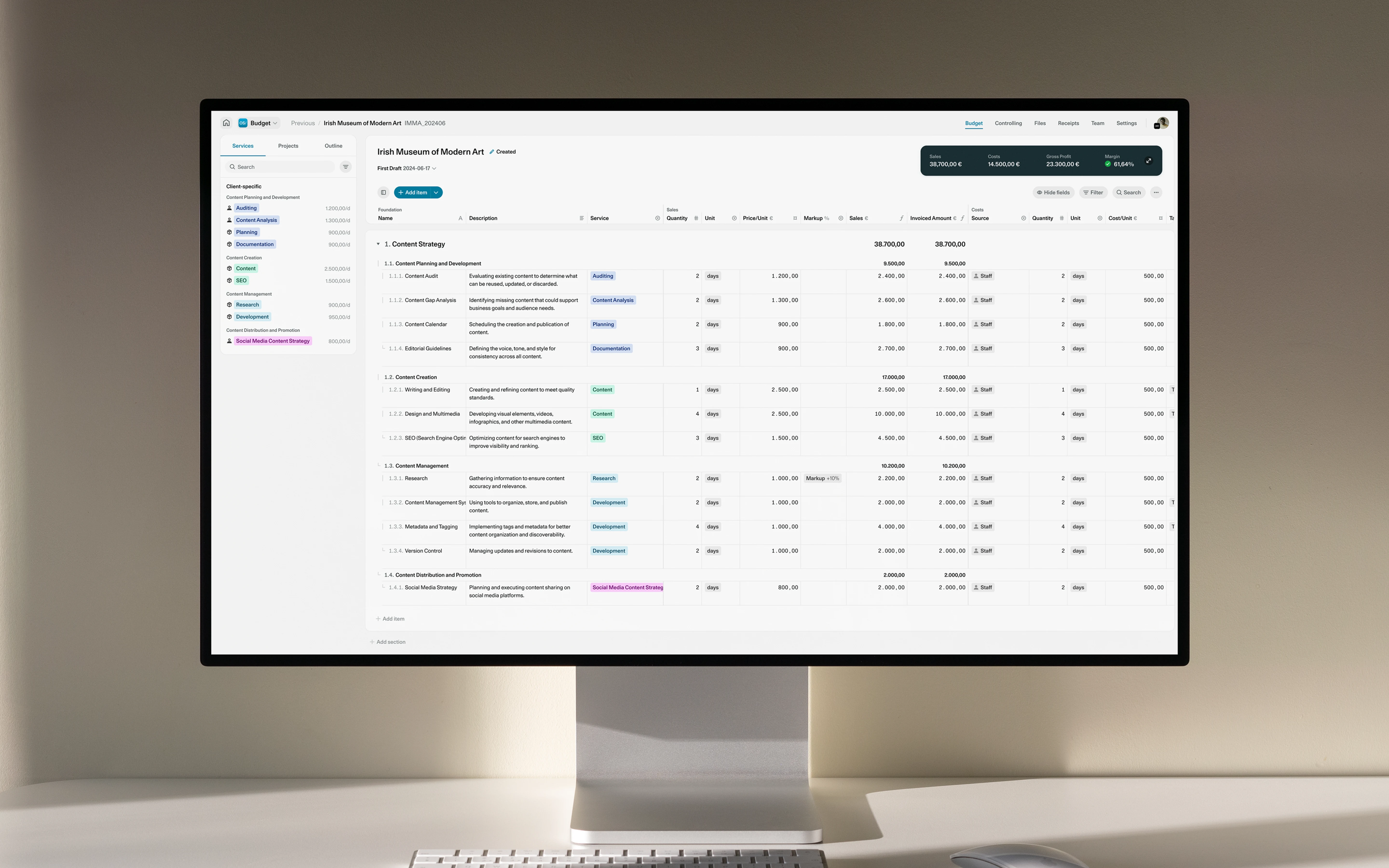 OS project budget interface displayed on a desktop monitor